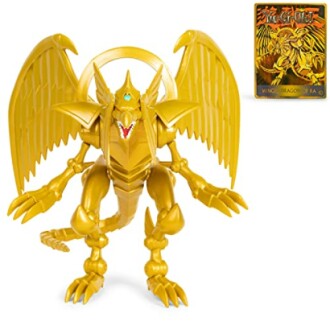 Golden dragon figure with card, featuring wings and detailed design.