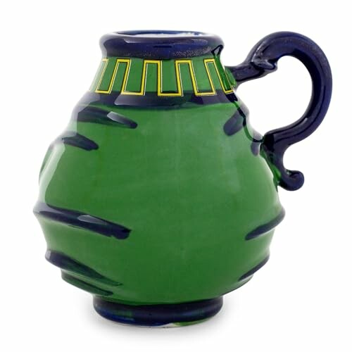 Green ceramic pitcher with decorative handle and geometric pattern