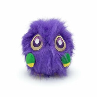 Purple furry toy with big eyes and green accents.